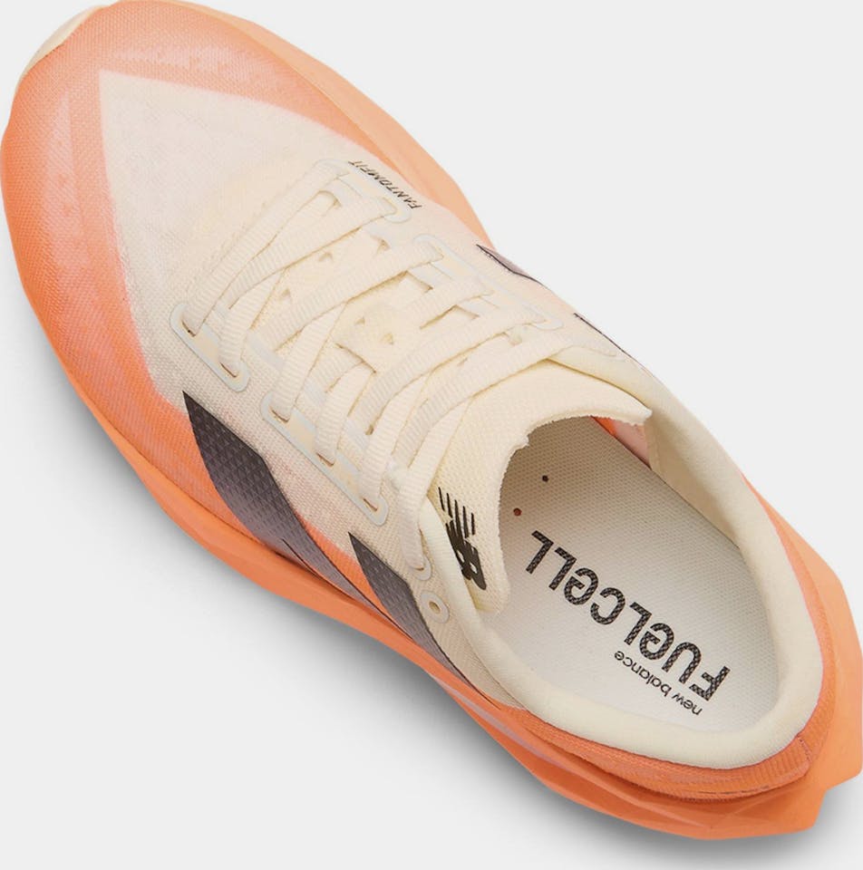 New Balance Women's Fuel Cell Rebel v4 Mango 11