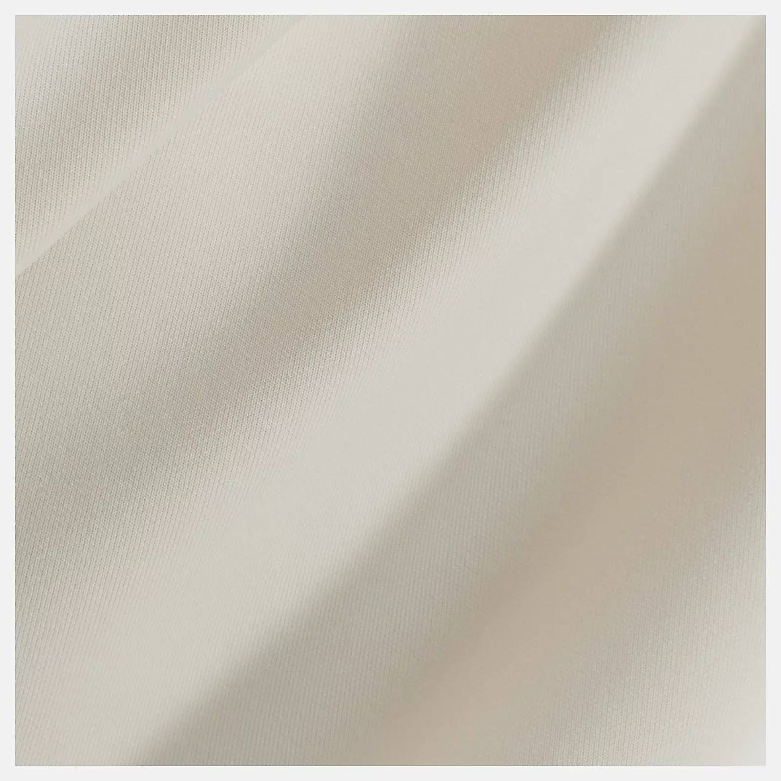 New Balance Women's Tech Knit Oversized Half Zip Linen 09