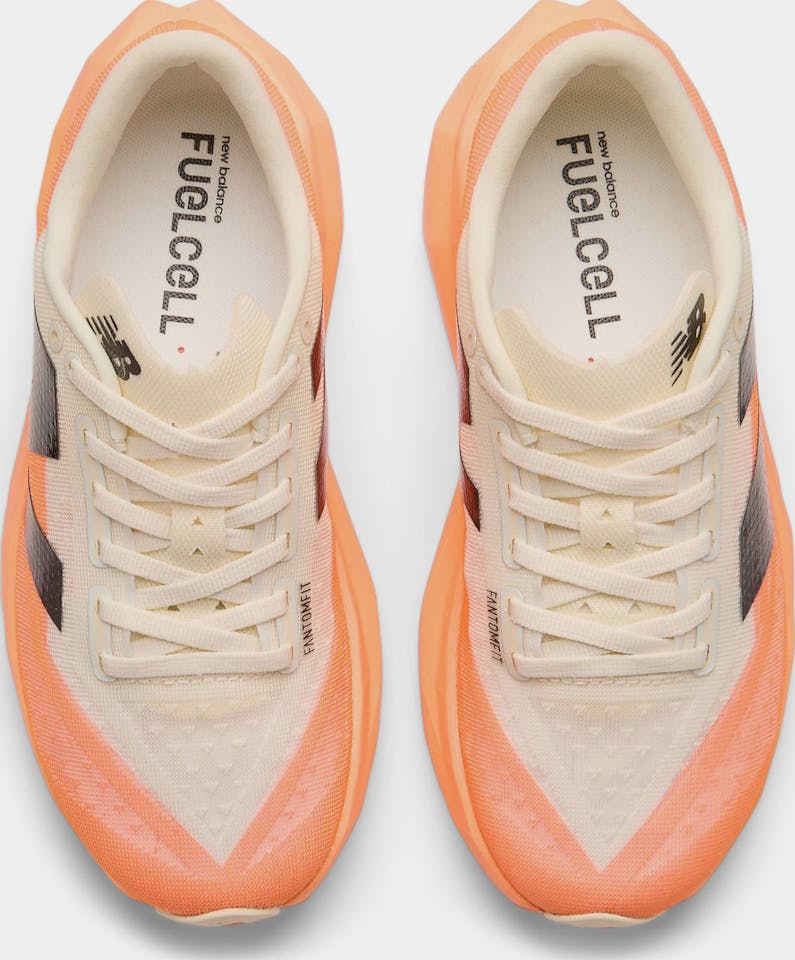 New Balance Women's Fuel Cell Rebel v4 Mango 05