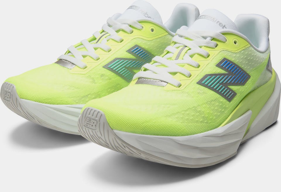 New Balance Women's Fuel Cell Rebel V5 Afterglow / Deep End 06